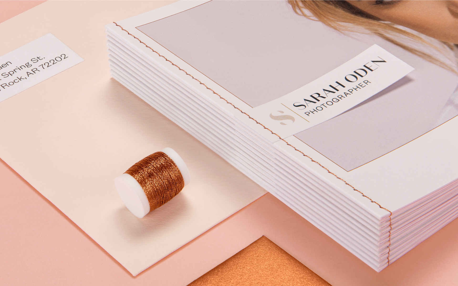 Sarah Oden Photographer direct mailer graphic design detail shot showing tag and copper binding